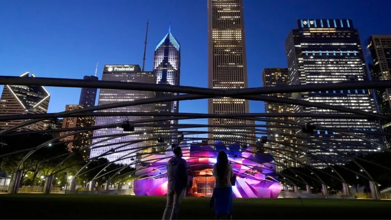 Crowds gather at a Chicago summer festival in Grant Park near the skyline