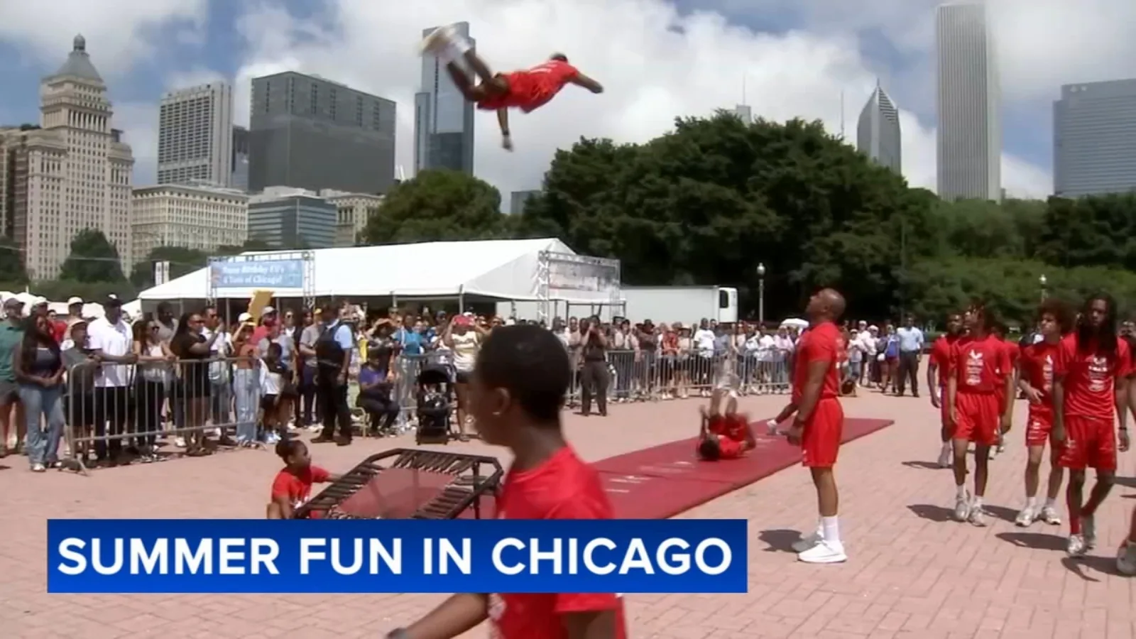 Crowds gather at a Chicago summer festival with food vendors and entertainment