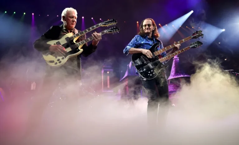 Rush performs at the United Center in Chicago during a comeback concert with a tribute to Neil Peart