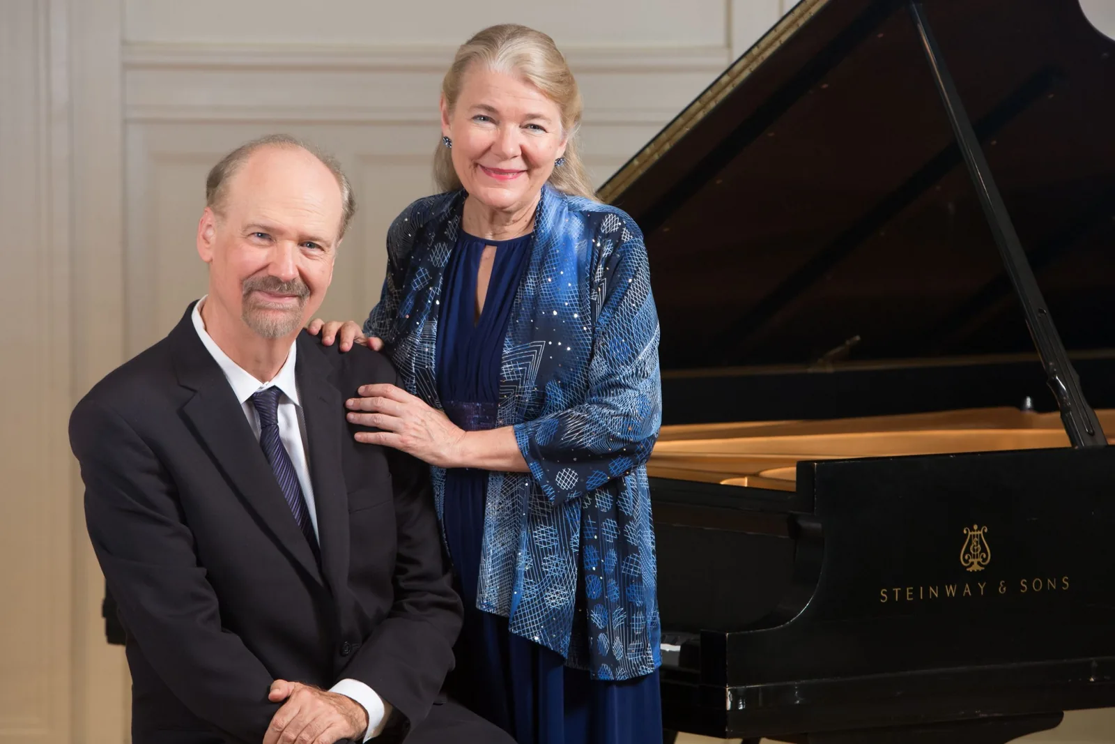 Claire Aebersold and Ralph Neiweem perform four-hand piano music at Nichols Concert Hall in Evanston