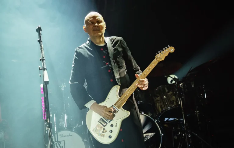 Smashing Pumpkins performing onstage with guest appearances from Melissa Auf der Maur and Barry Williams