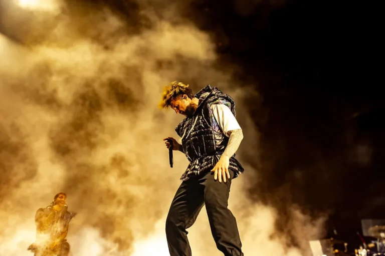 Electric Callboy performs onstage in Chicago as fans dance and sing inside Wintrust Arena