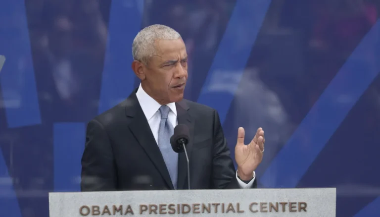 Barack and Michelle Obama onstage at the opening ceremony of the Obama Presidential Center in Chicago