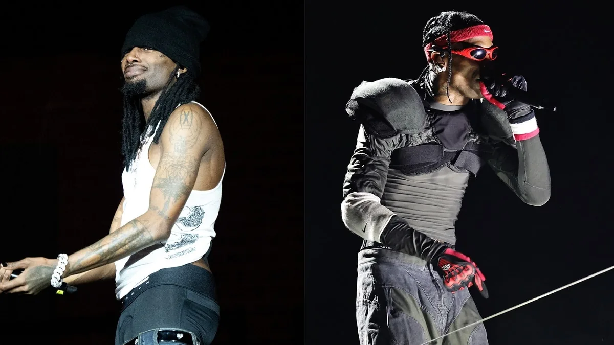 Playboi Carti performing onstage at Soldier Field with Travis Scott during a Chicago concert