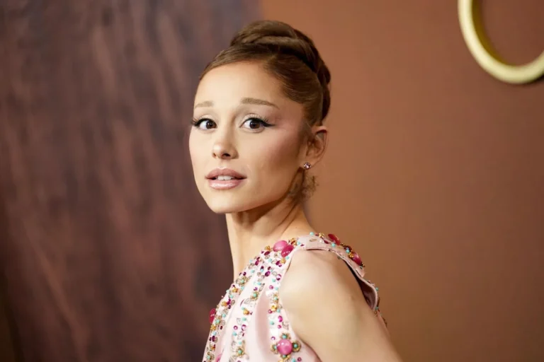 Ariana Grande speaking onstage during her Chicago concert