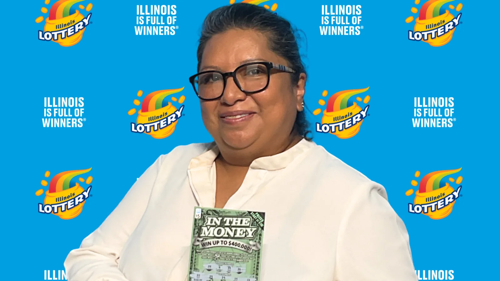 Illinois Lottery scratch-off ticket and a convenience store counter in Chicago's Gage Park