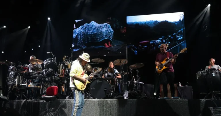 Santana and the Doobie Brothers performing for a crowd at El Paso's Don Haskins Center