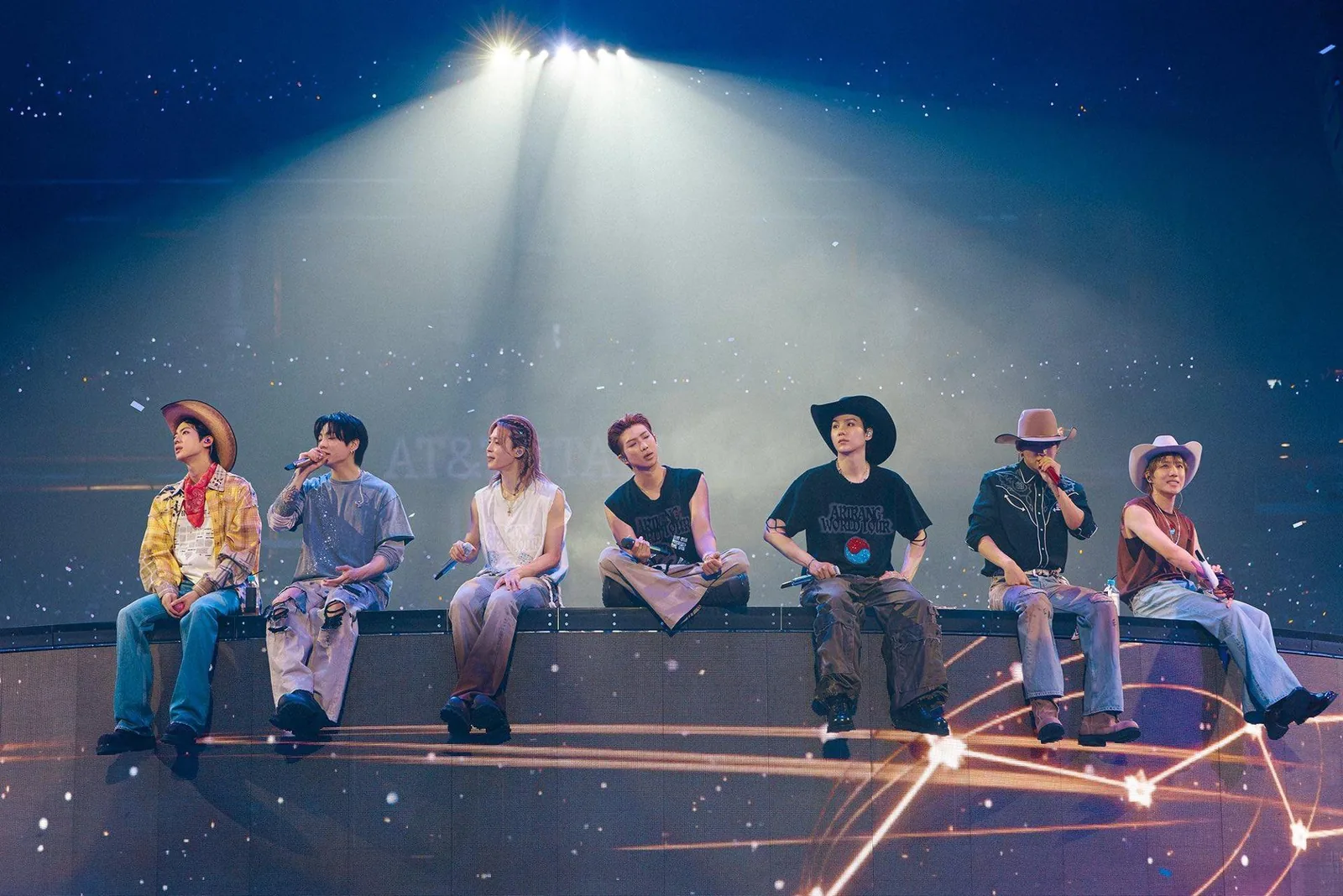 BTS performance lights up a stadium stage during a concert