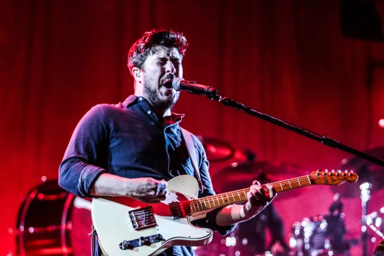 Mumford & Sons performing onstage at Madison Square Garden during the Prizefighter tour