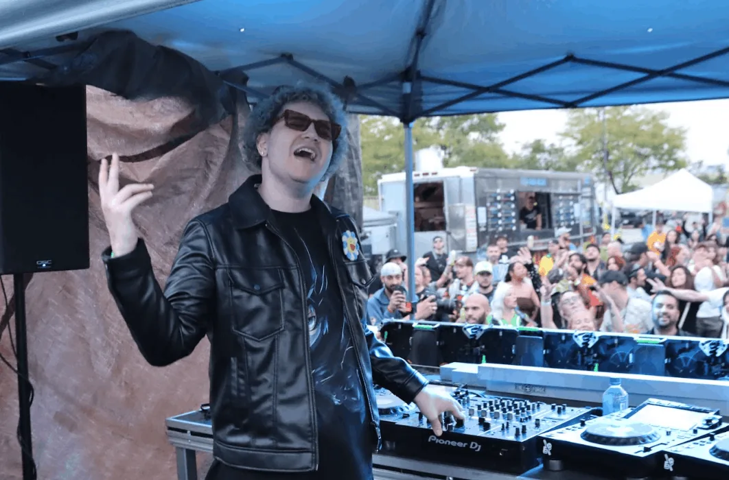 Festival crowd dancing at an outdoor Chicago-area music event