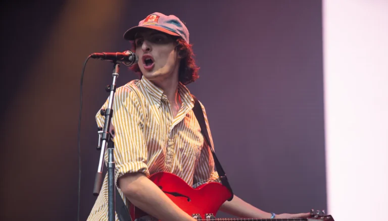 Finn Wolfhard performs on a Lollapalooza stage in Chicago during his solo festival debut