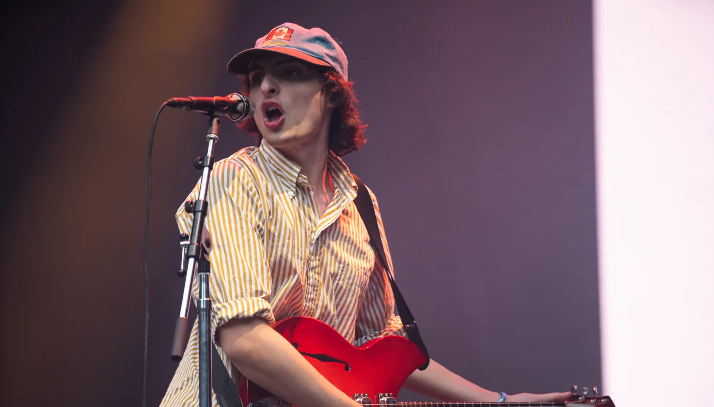 Finn Wolfhard performs on a Lollapalooza stage in Chicago during his solo festival debut