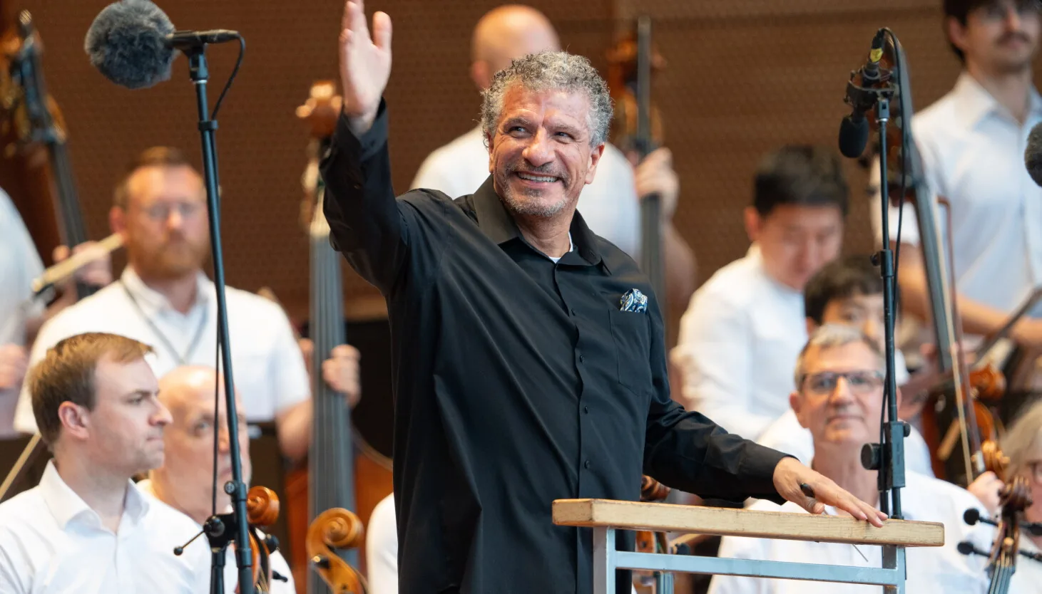Grant Park Music Festival performers onstage in Millennium Park during a summer concert