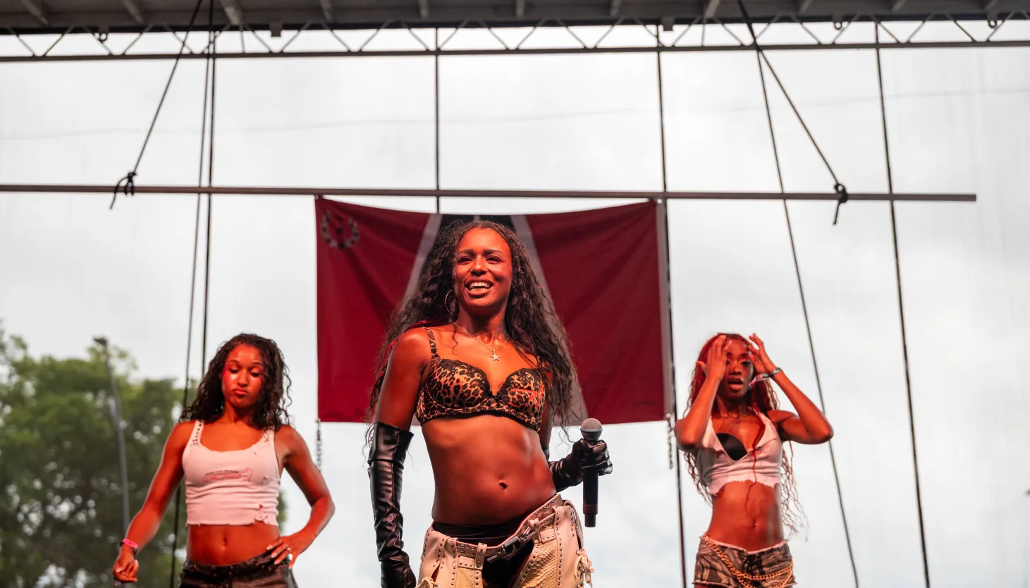Festivalgoers watch an emerging artist perform on a Lollapalooza stage in Grant Park
