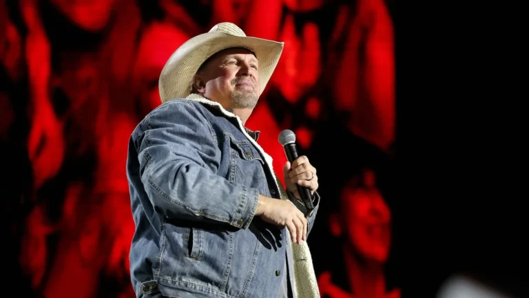 Garth Brooks performing onstage during a concert