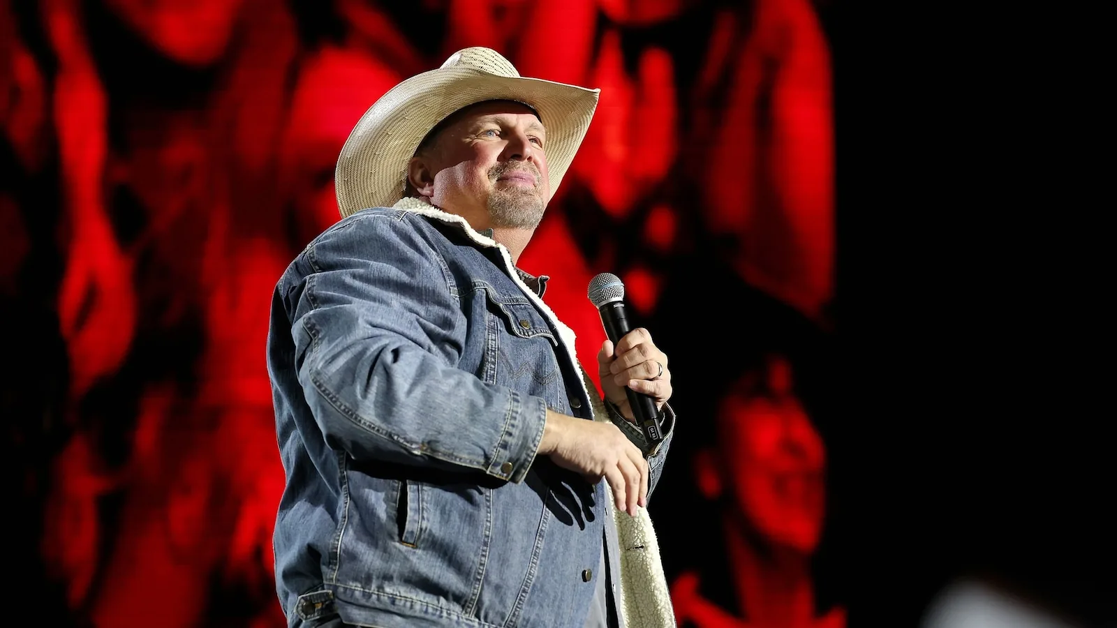 Garth Brooks performing onstage during a concert
