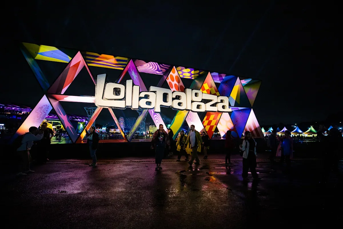 Crowds at Lollapalooza in Chicago with the festival stage in the background