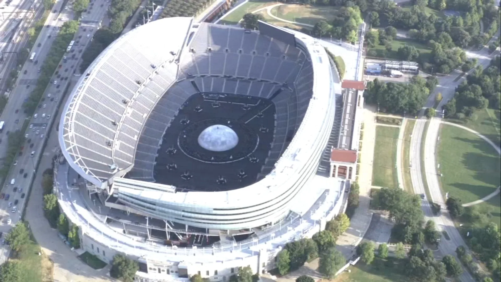 Fans line up outside Soldier Field in hot weather for Ye's Chicago concerts