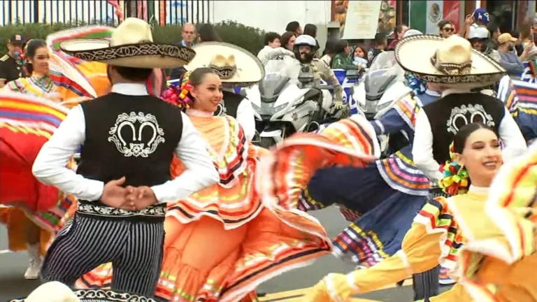 Crowds gather along Cesar E. Chavez Avenue for the East LA Mexican Independence Day Parade