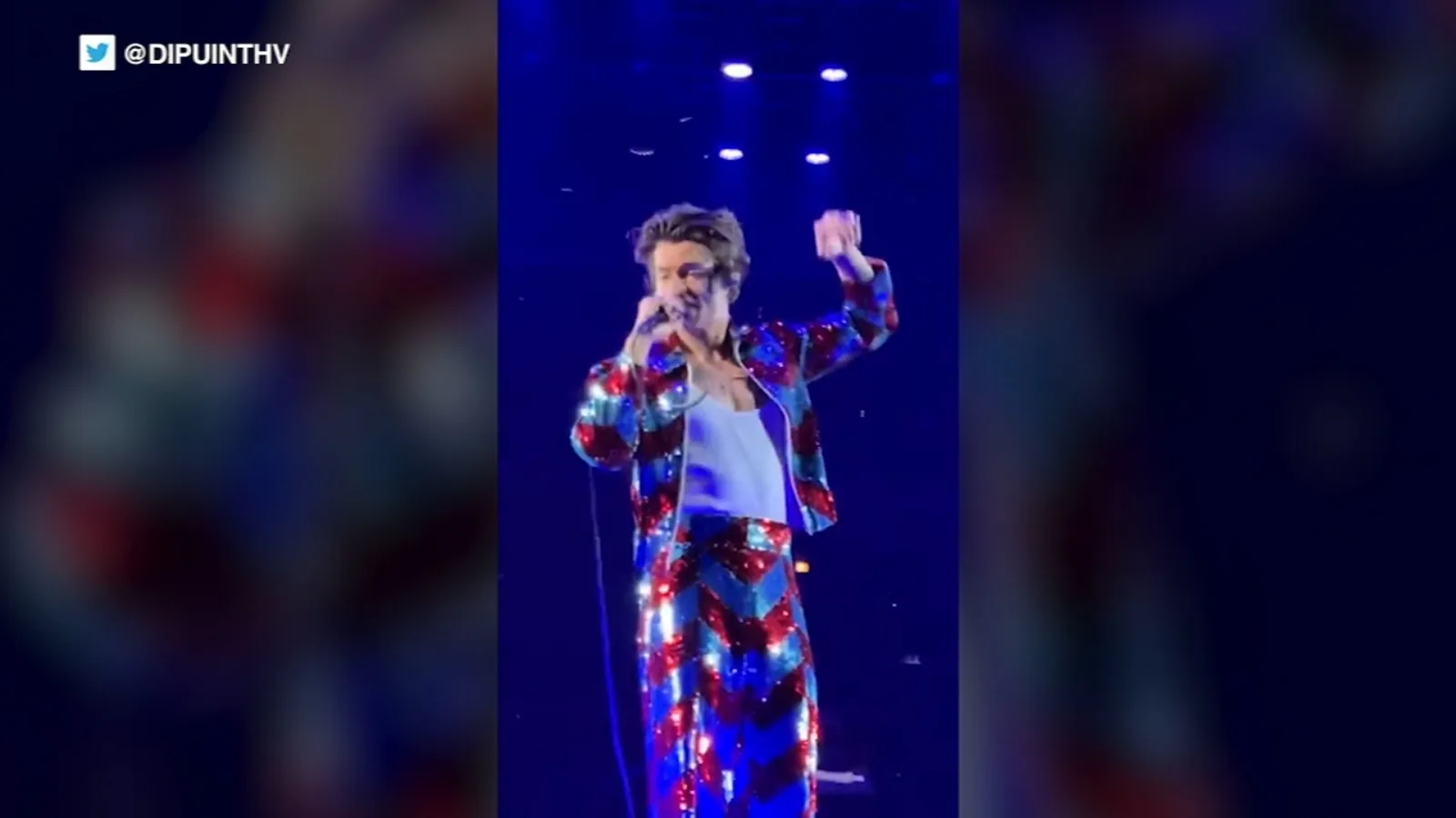 Harry Styles performing onstage during a concert tour announcement