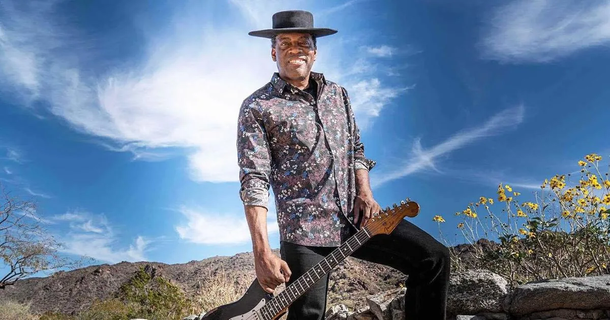 Blues guitarist Carvin Jones performing onstage with his guitar