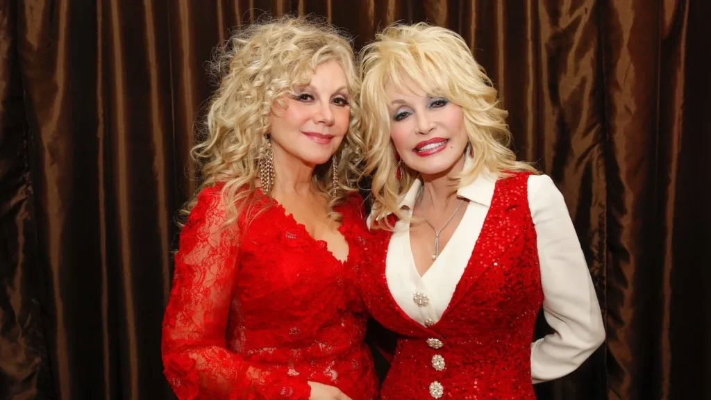 Stella Parton Urges Compassion After Dolly Parton Death as AI Posts and Trolls Flood Tribute Feeds Following the Country Icon’s Aug. 25 Passing
