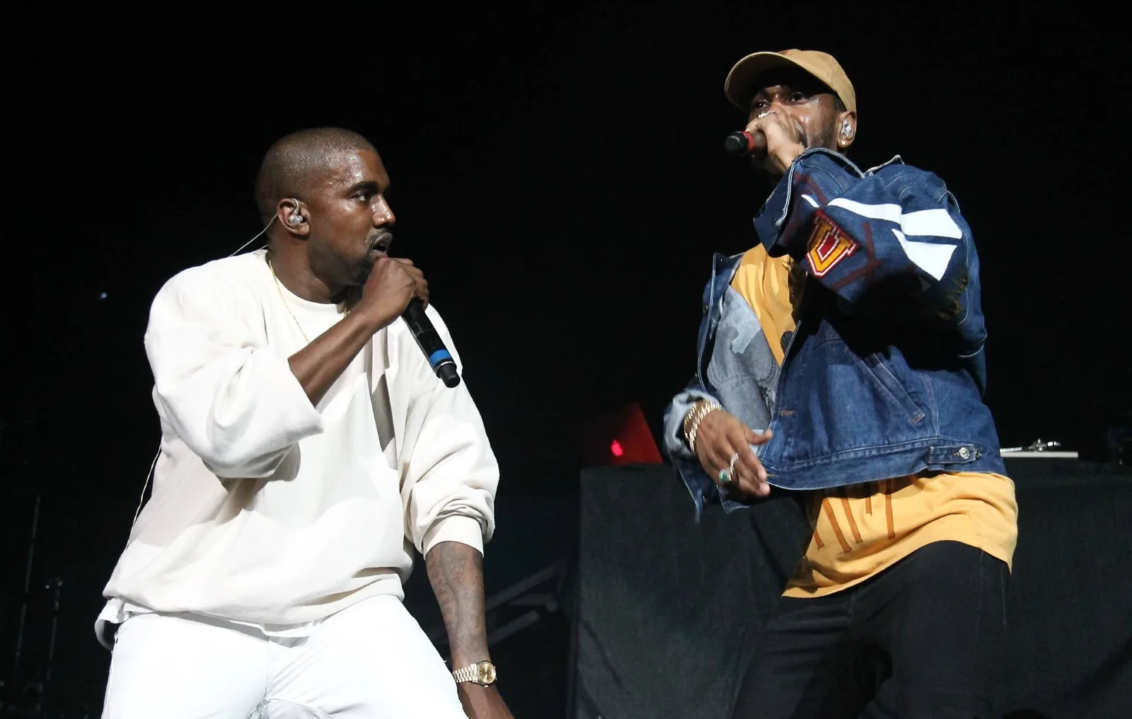 Big Sean and Kanye West performing together onstage at Soldier Field in Chicago