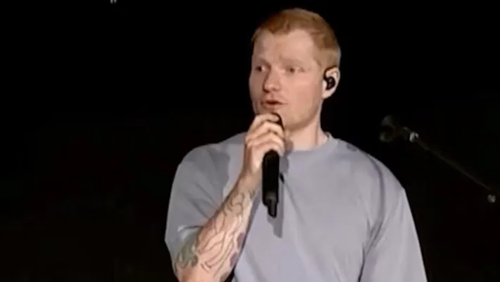 Ed Sheeran performing onstage at Lincoln Financial Field during the opening night of his Loop Tour