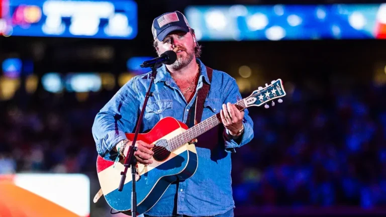 Country singer Ernest performing onstage during a live country music event