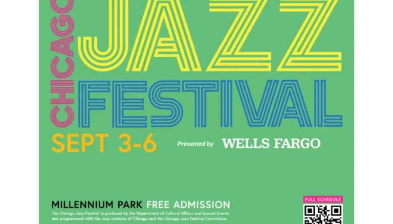 Crowd gathered in Millennium Park for the Chicago Jazz Festival with a stage and city skyline