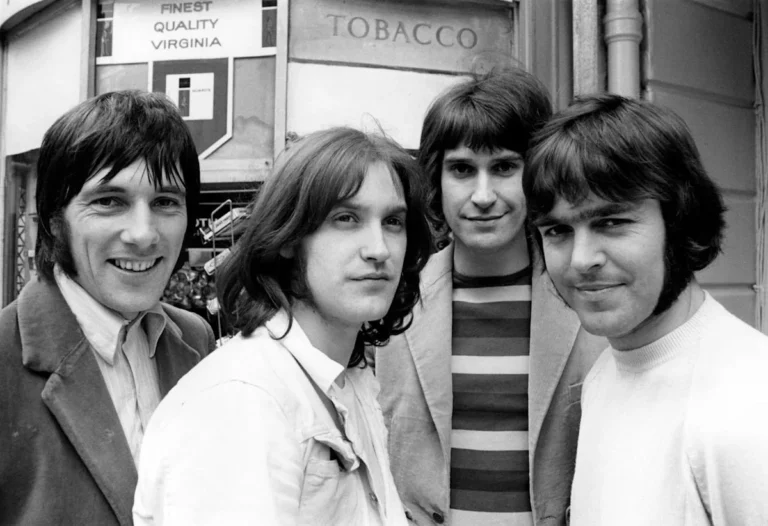 Ray Davies of The Kinks performing during the band's 1965 era