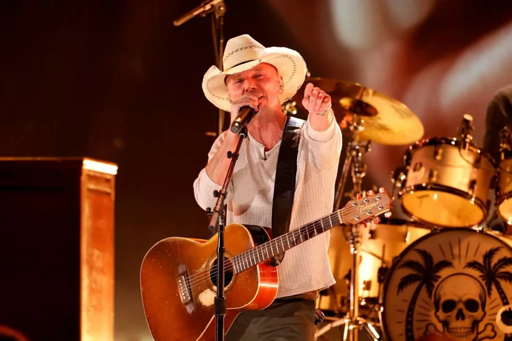 Kenny Chesney Rejects the Usual Country Album Cover Playbook With a Self-Shot New Hampshire Marina Sign for Silver Sands Marina, Due September 25