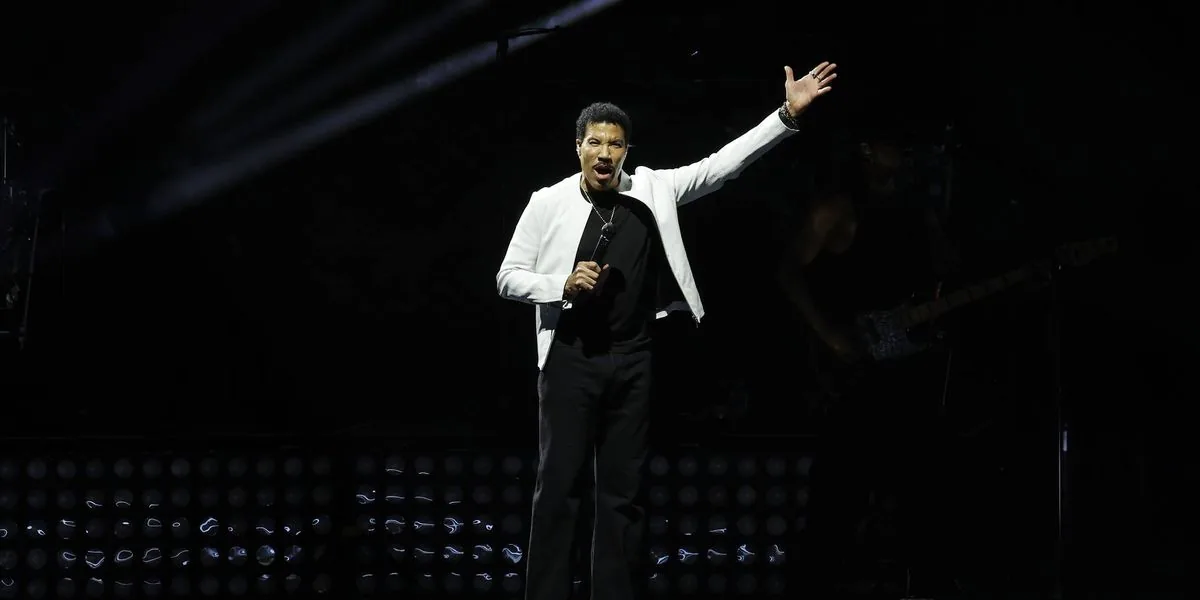 Lionel Richie performing onstage at The Muny before being hospitalized in St. Louis