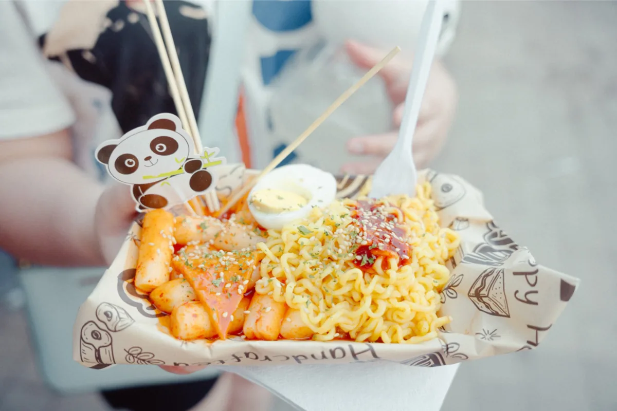 Panda Fest branding with food vendors and panda-themed festival activities at an outdoor event