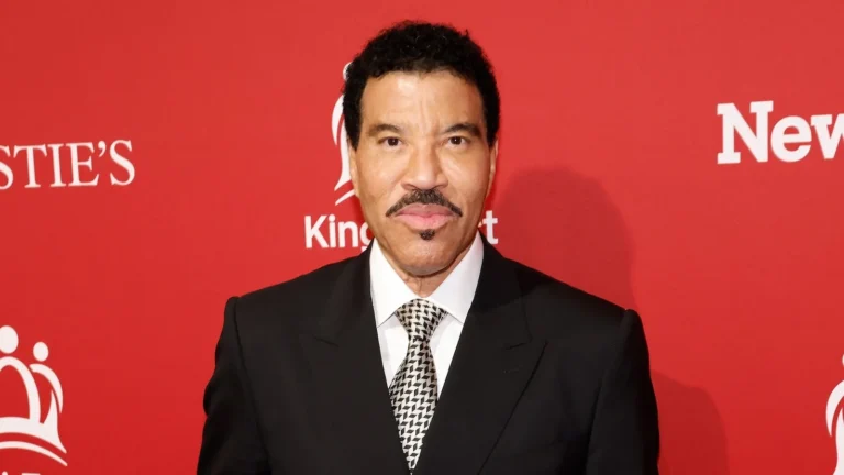 Lionel Richie performing onstage during a summer concert