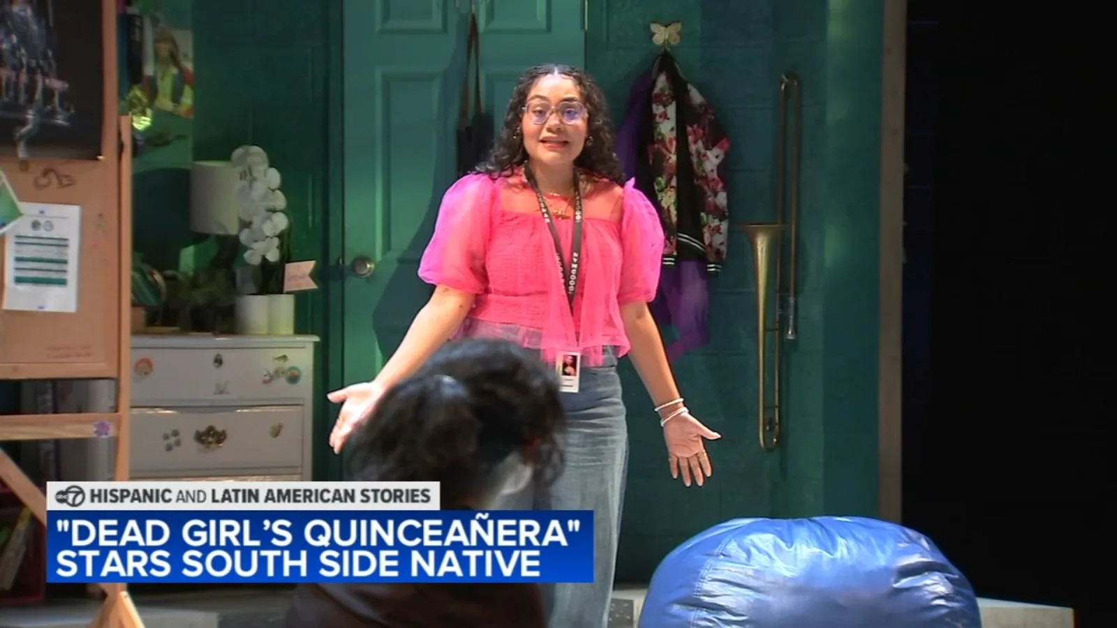Ariana Burks stands onstage at Goodman Theatre during Dead Girl's Quinceañera
