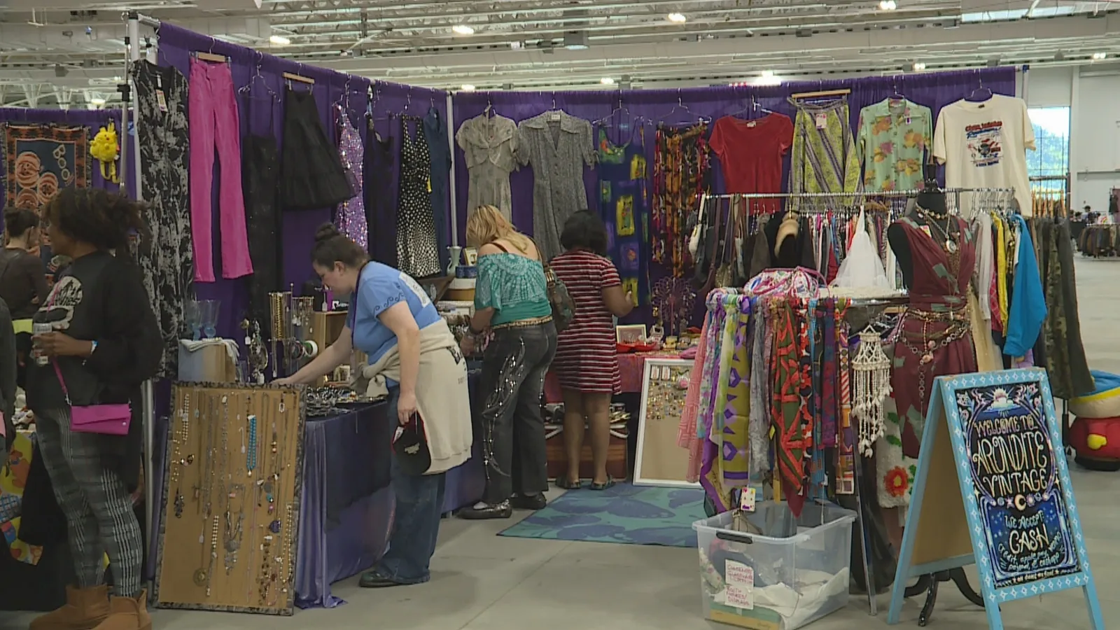 Shoppers browse vintage clothing and collectibles at the Totally Rad Vintage Fest in Indianapolis
