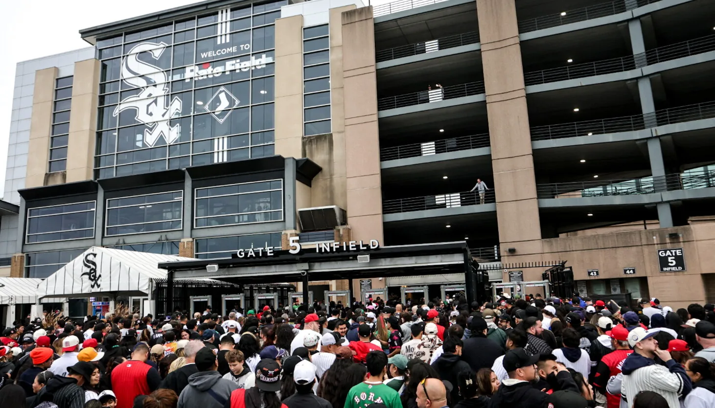 White Sox fans during a playoff game at Rate Field with ticket prices surging online